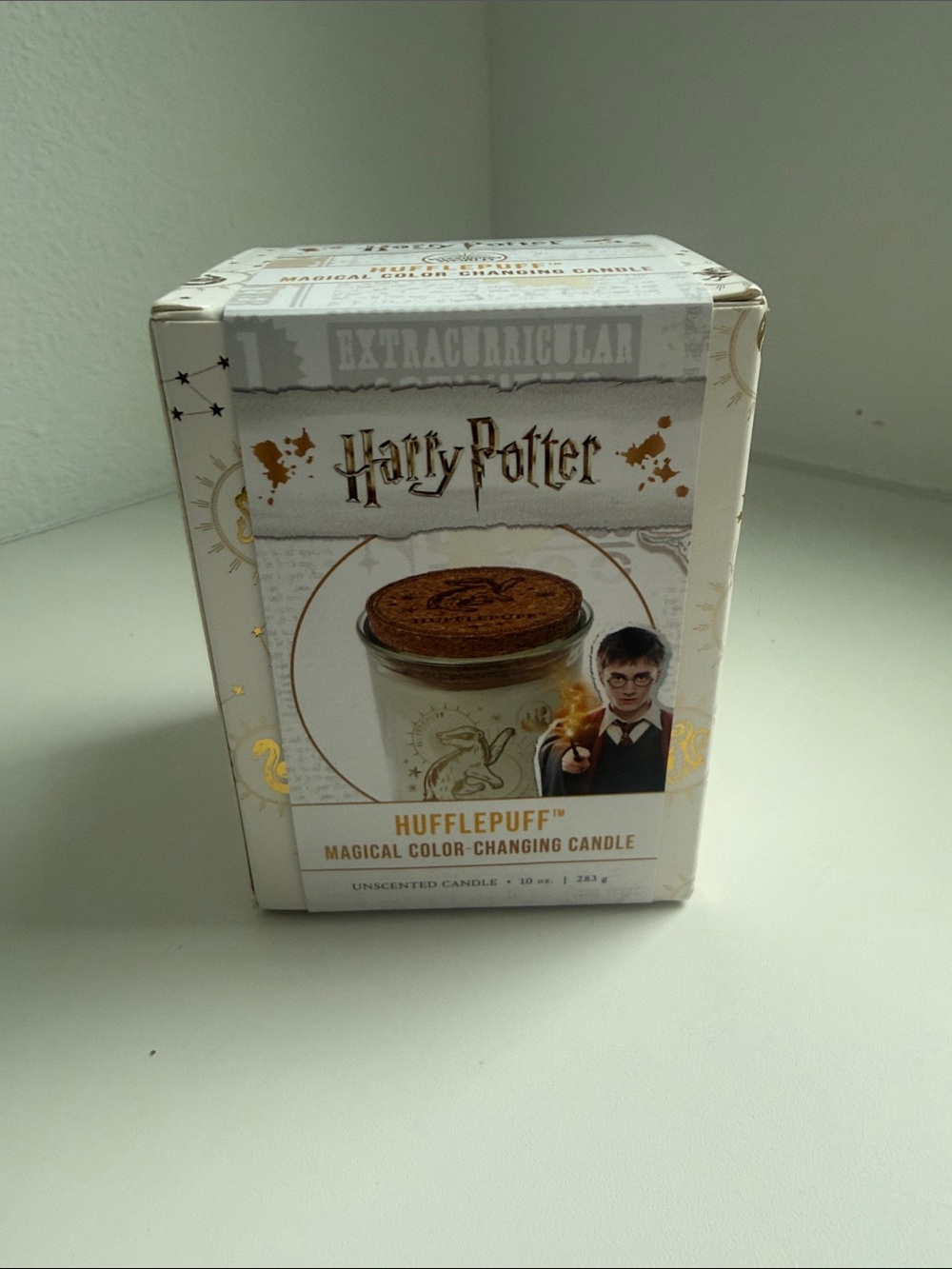 Warner Bros. Hufflepuff Magical Color-Changing Candle - White & Gold Accents